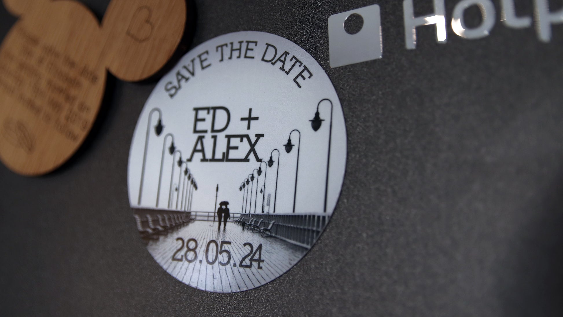 Circle magnet with save the date design black and white