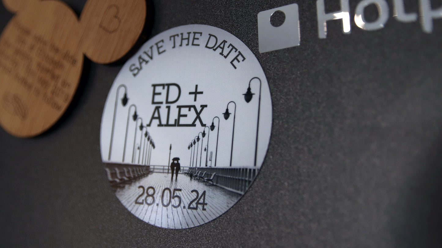 Circle magnet with save the date design black and white