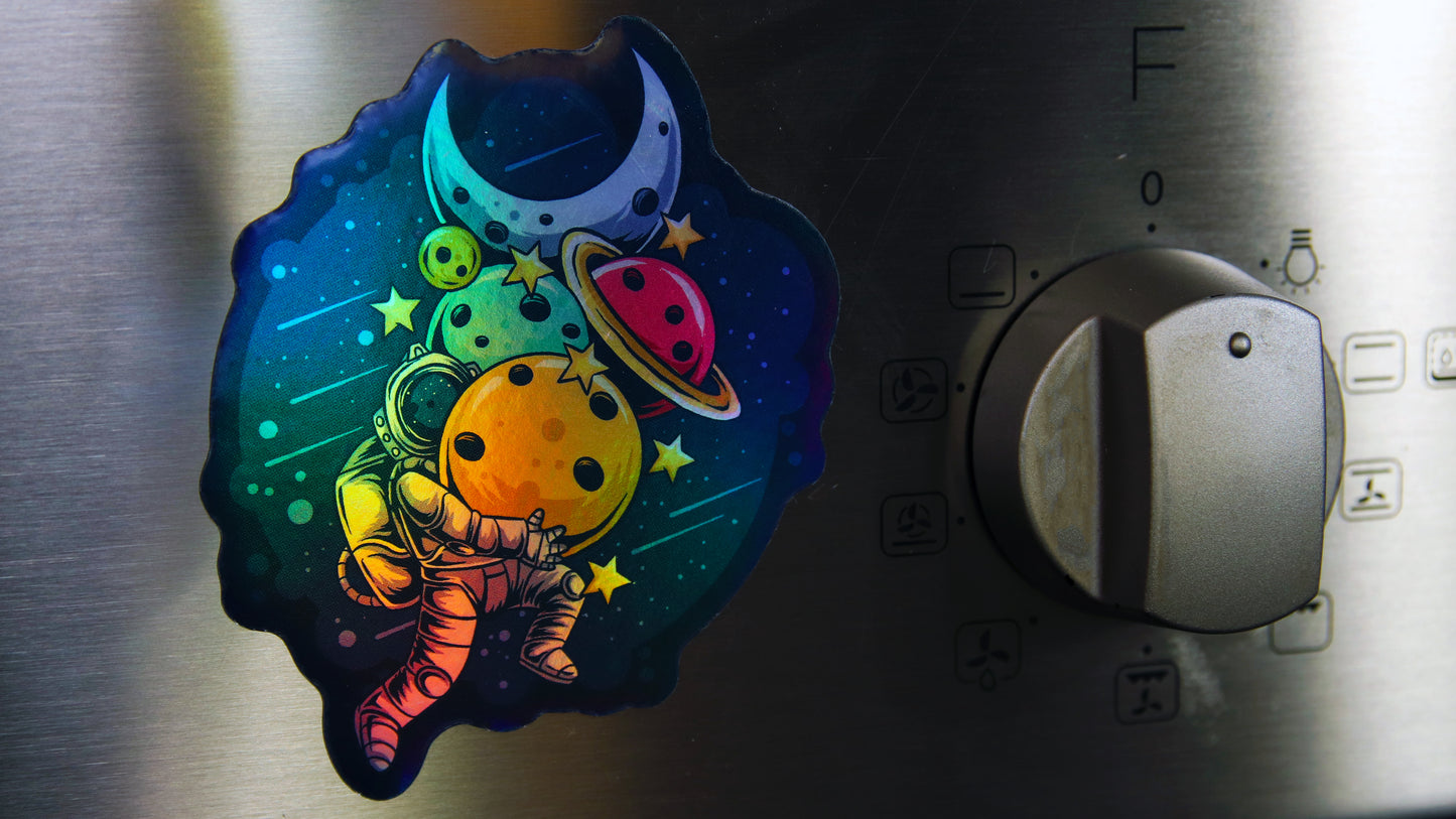 Custom-shaped die-cut magnet applied to a metal oven