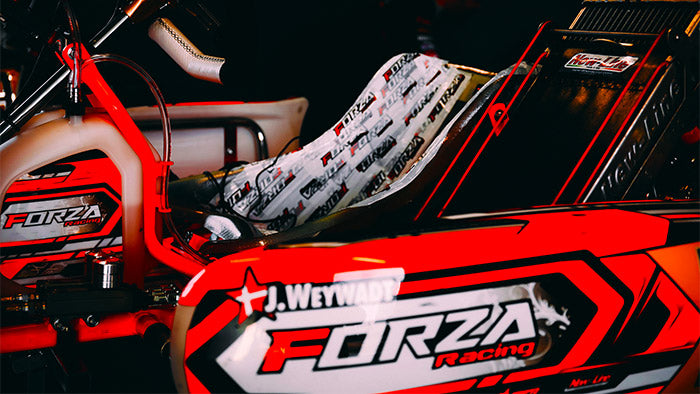 Ricky Flynn Motorsport kart on the grid with custom printed graphics