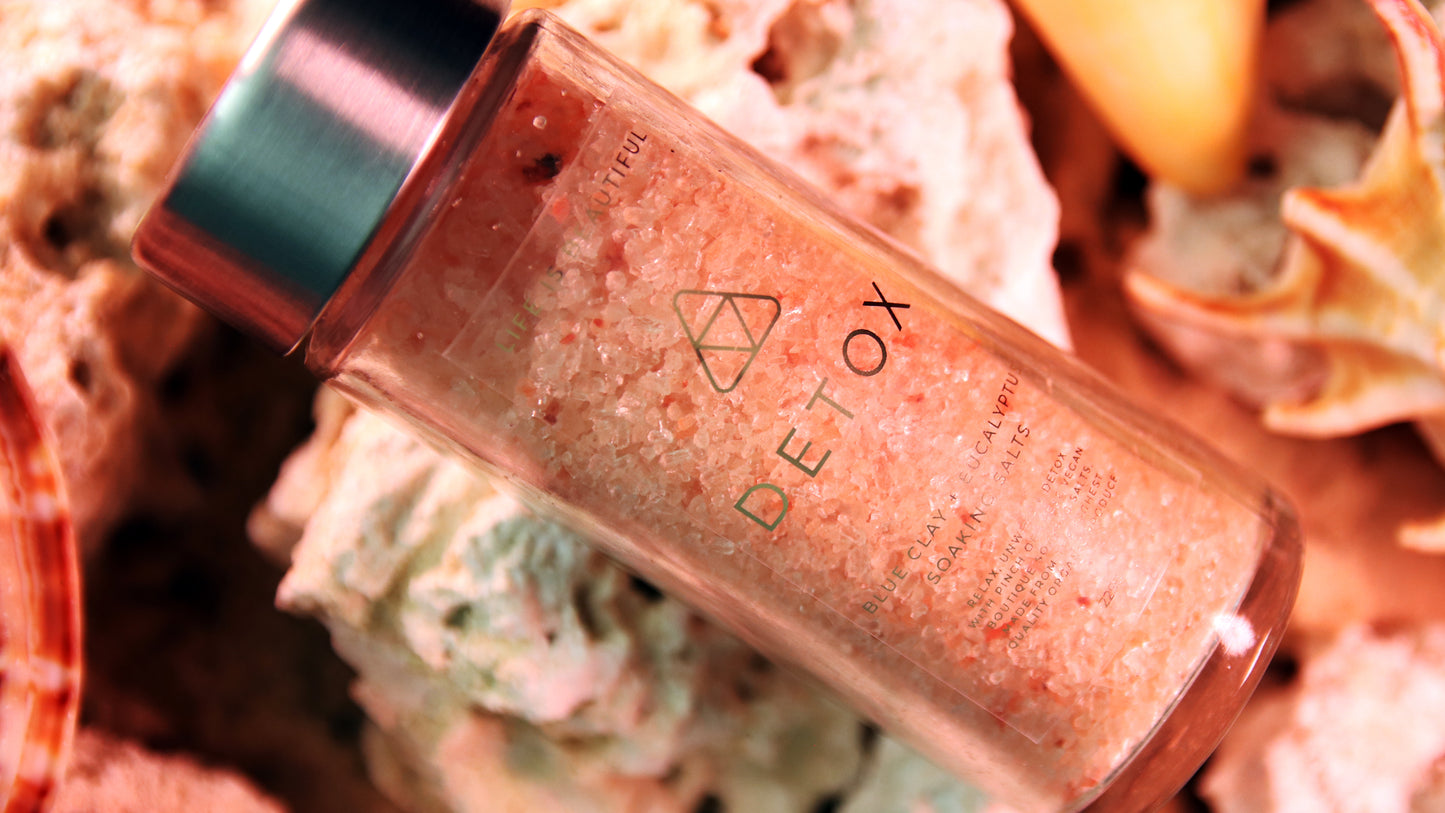 Rectangle eco-friendly gold foil sticker with detox design applied to a clear jar