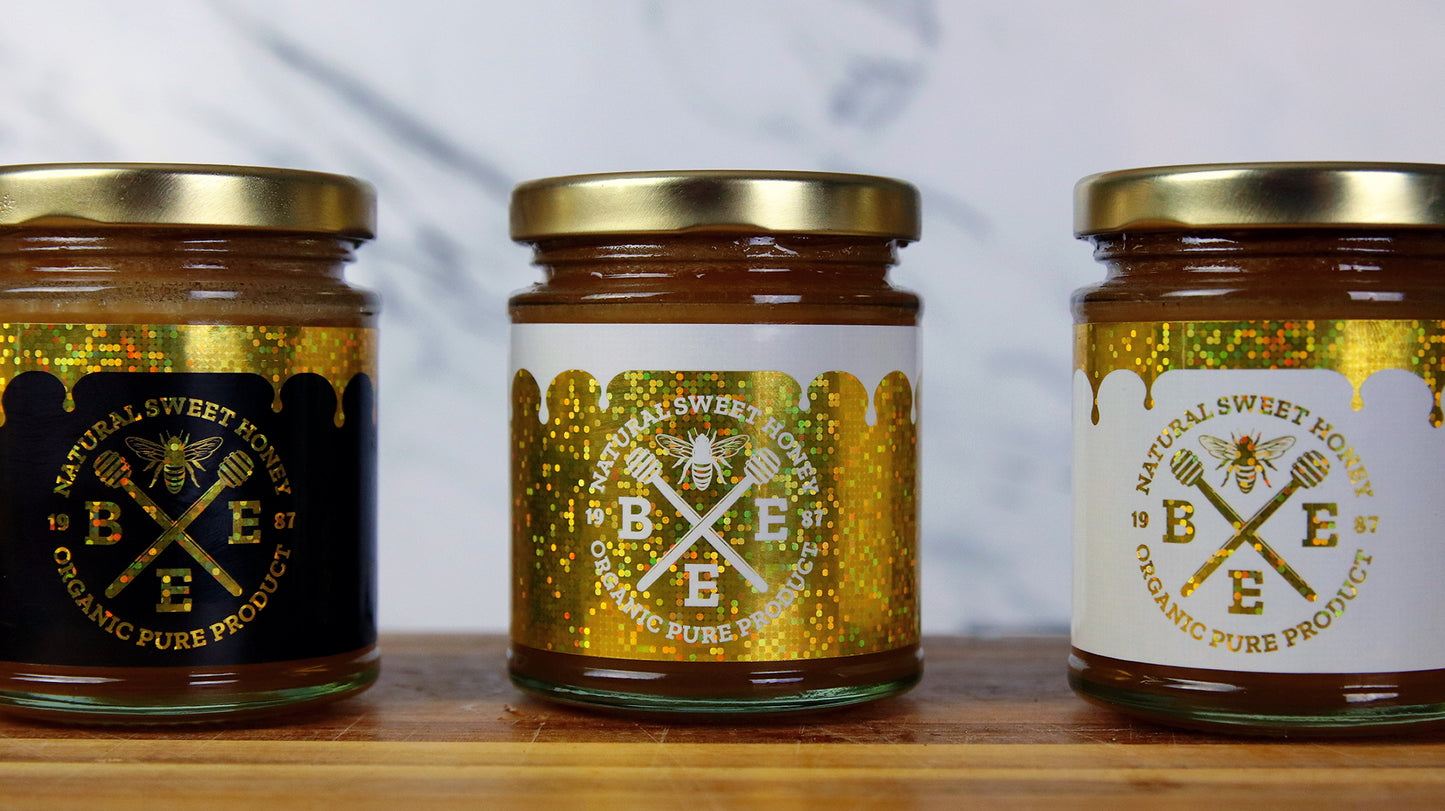 Recyclable labels in different colours used as honey jar labels