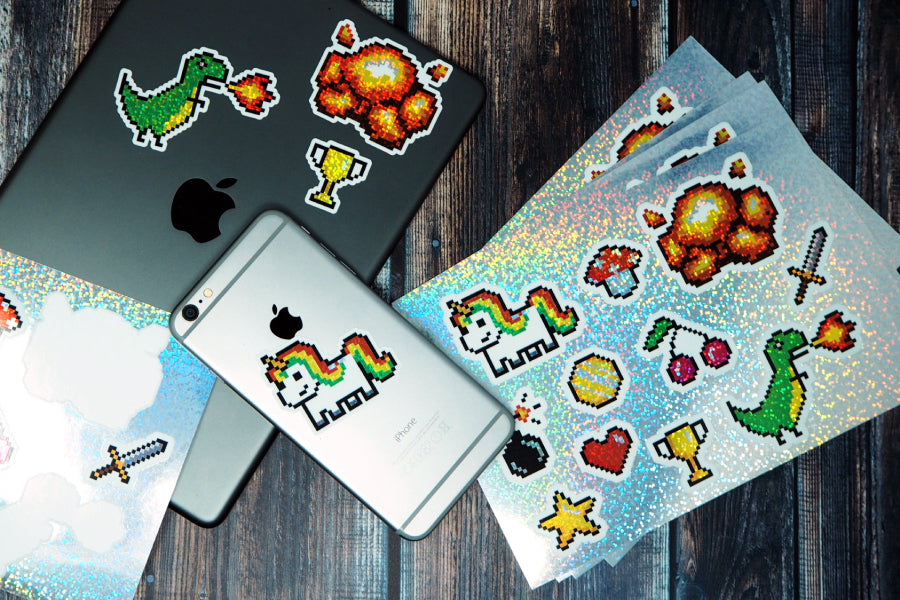 Die cut glitter labels applied to an iPad and an iPhone