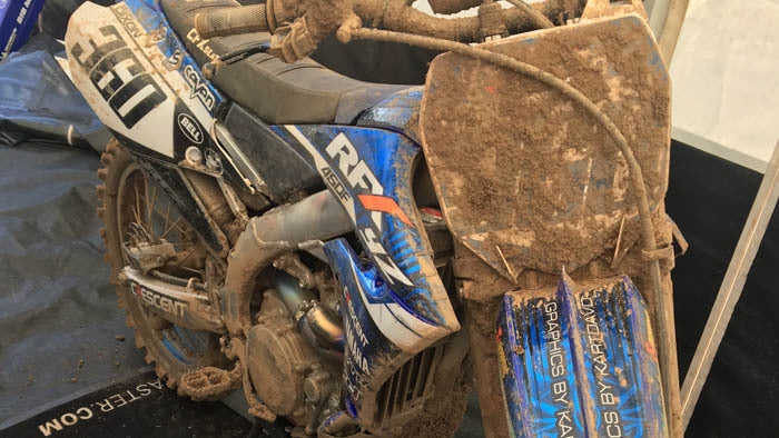 Die cut heavy duty sticker applied to a dirty bike