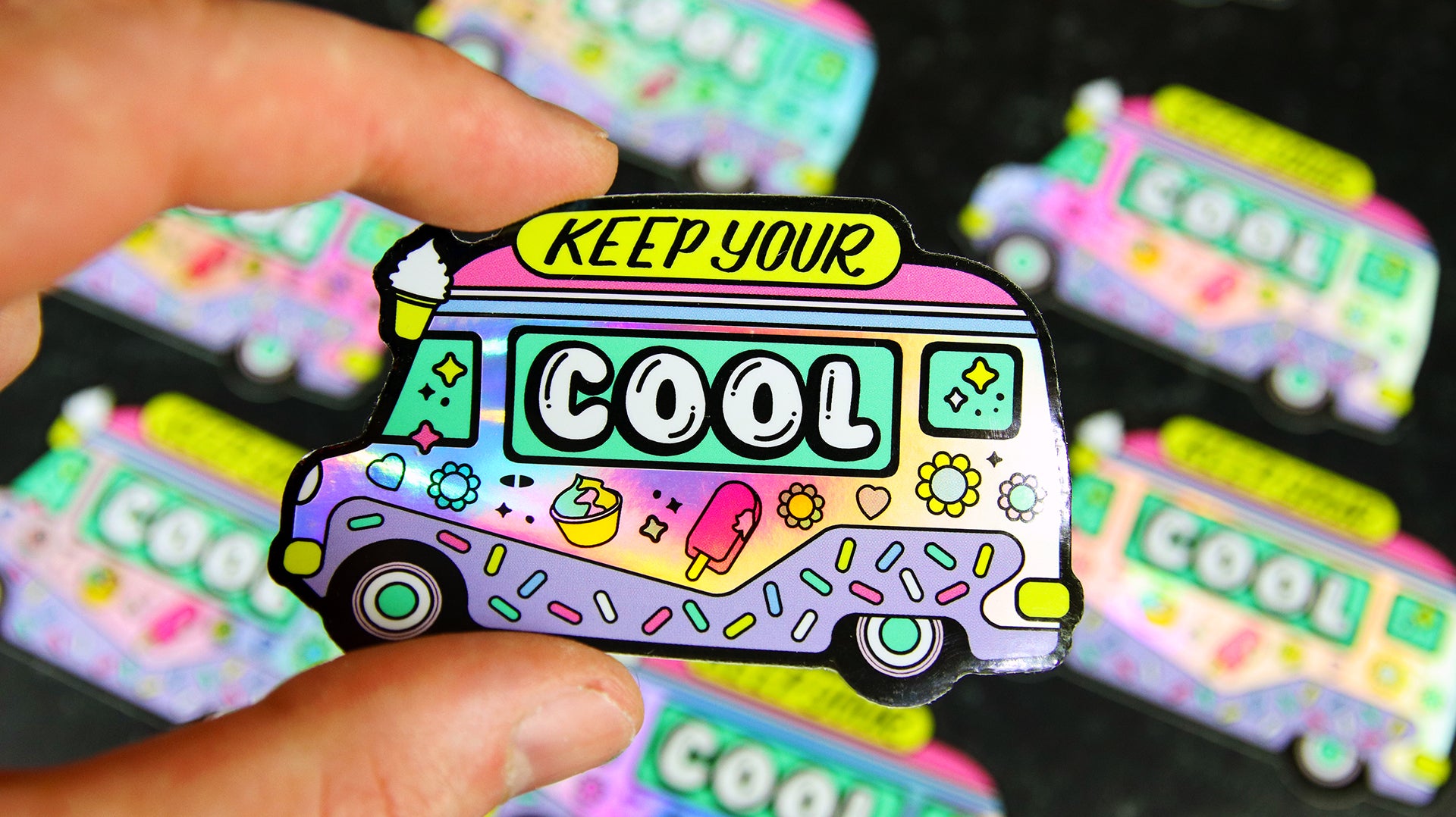 Die cut holographic sample with old school ice cream van design hand held