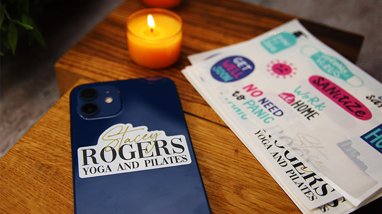 Die cut labels printed onto white vinyl with one design applied to a phone