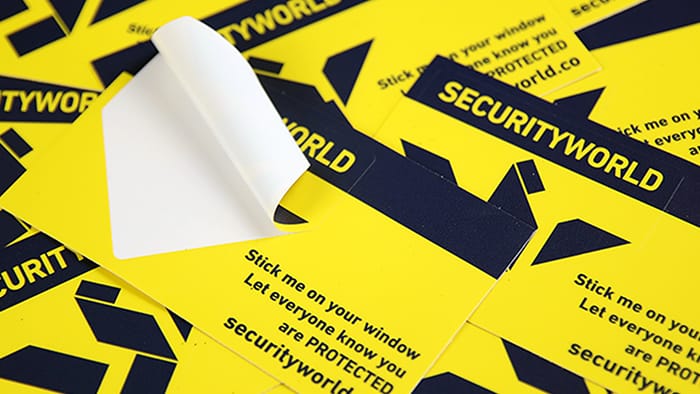 Kiss cut samples printed into white vinyl with security world logo