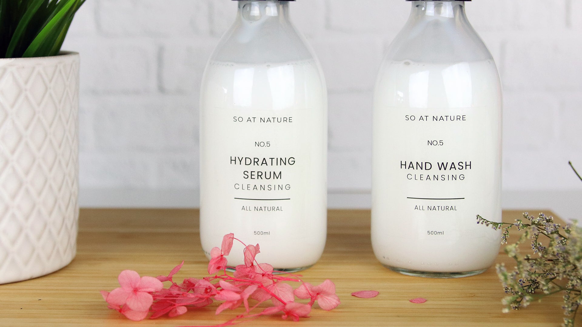 Rectangular clear eco friendly stickers applied to soap dispensers