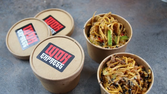 Rounded corner eco-friendly labels applied to cardboard deli tubs