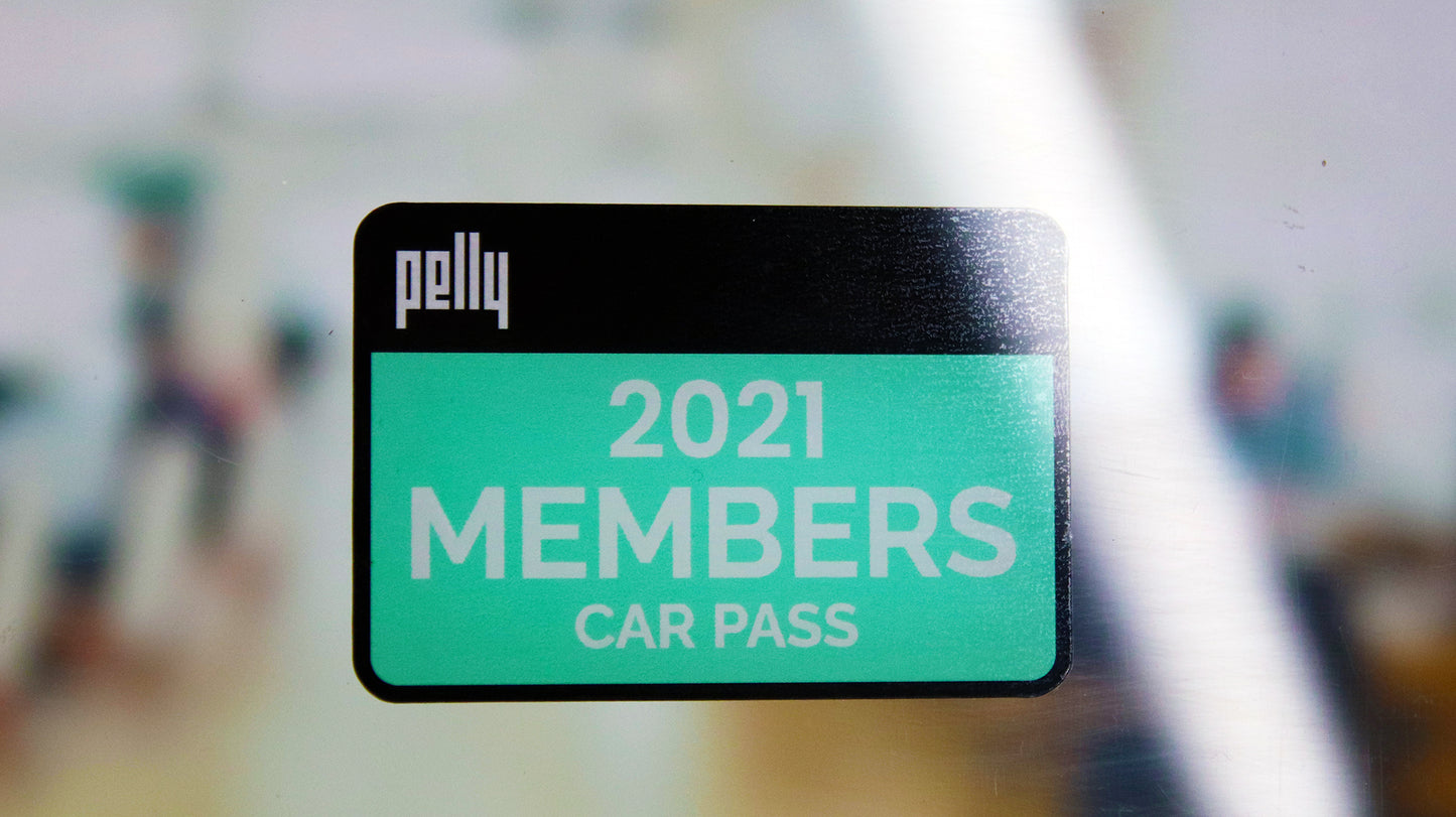 Rounded corner front adhesive window sticker with car pass members logo