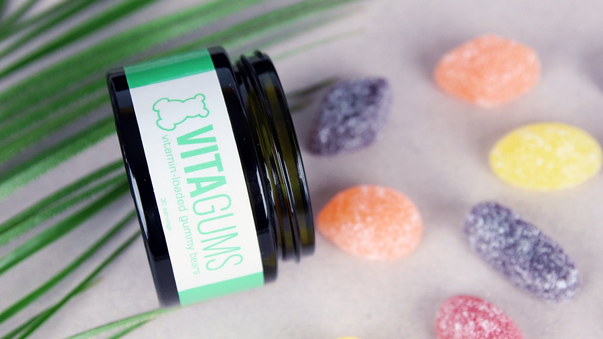 Sweet jar label applied to a black tin filled with boiled sweets