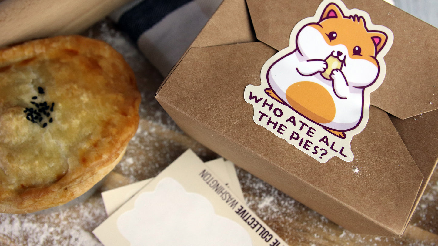 White vinyl kiss cut sticker with hamster design applied to a cardboard food box