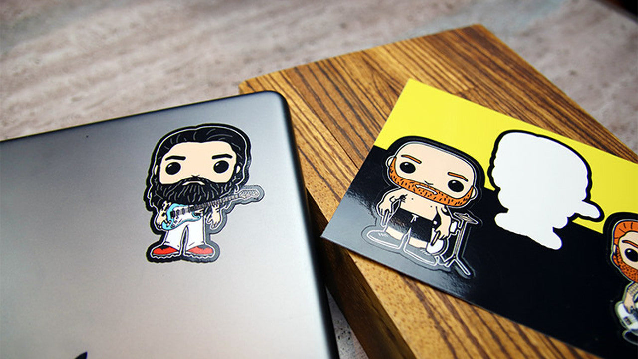 White vinyl labels peeled with one design applied to an iPad